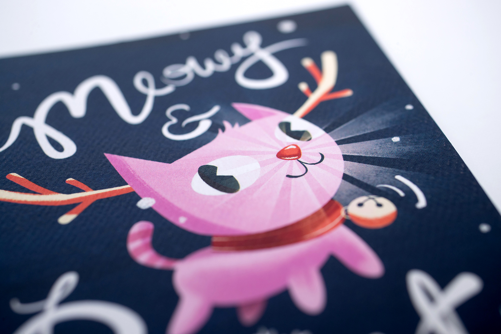 closeup of illustrated cat holiday card