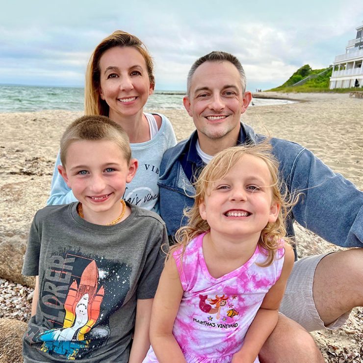 Lynn Spooner, Creative Director, with her family at the beach on Cape Cod
