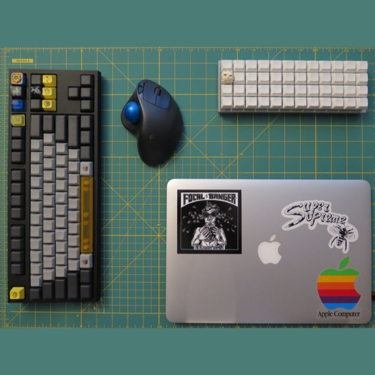 Keyboards, mouse, and a laptop