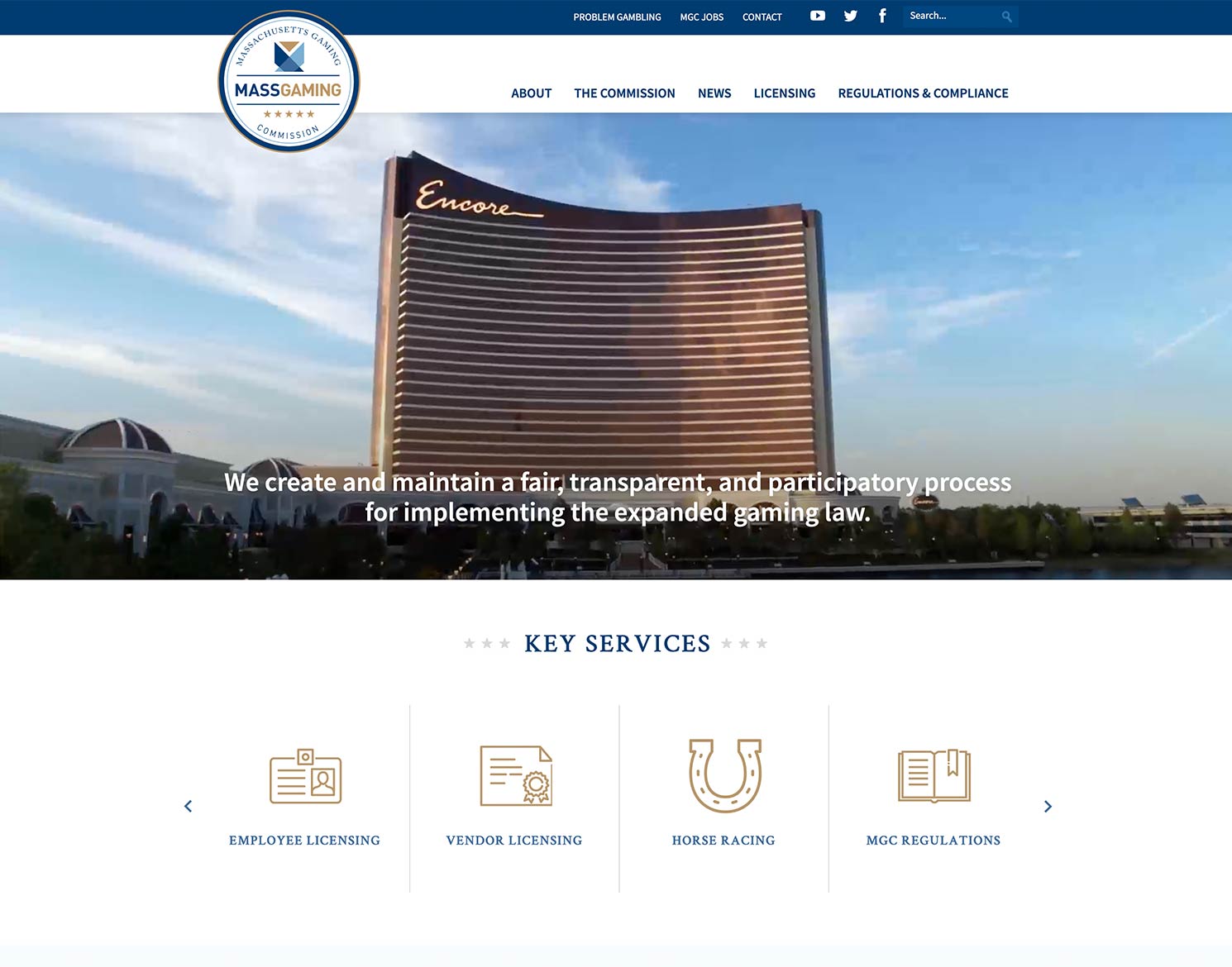 Massachusetts Gaming Commission website homepage - a main photo of the Encore Hotel with the caption "We create and maintain a fair, transparent, and participatory process for implementing the expanded gaming law."