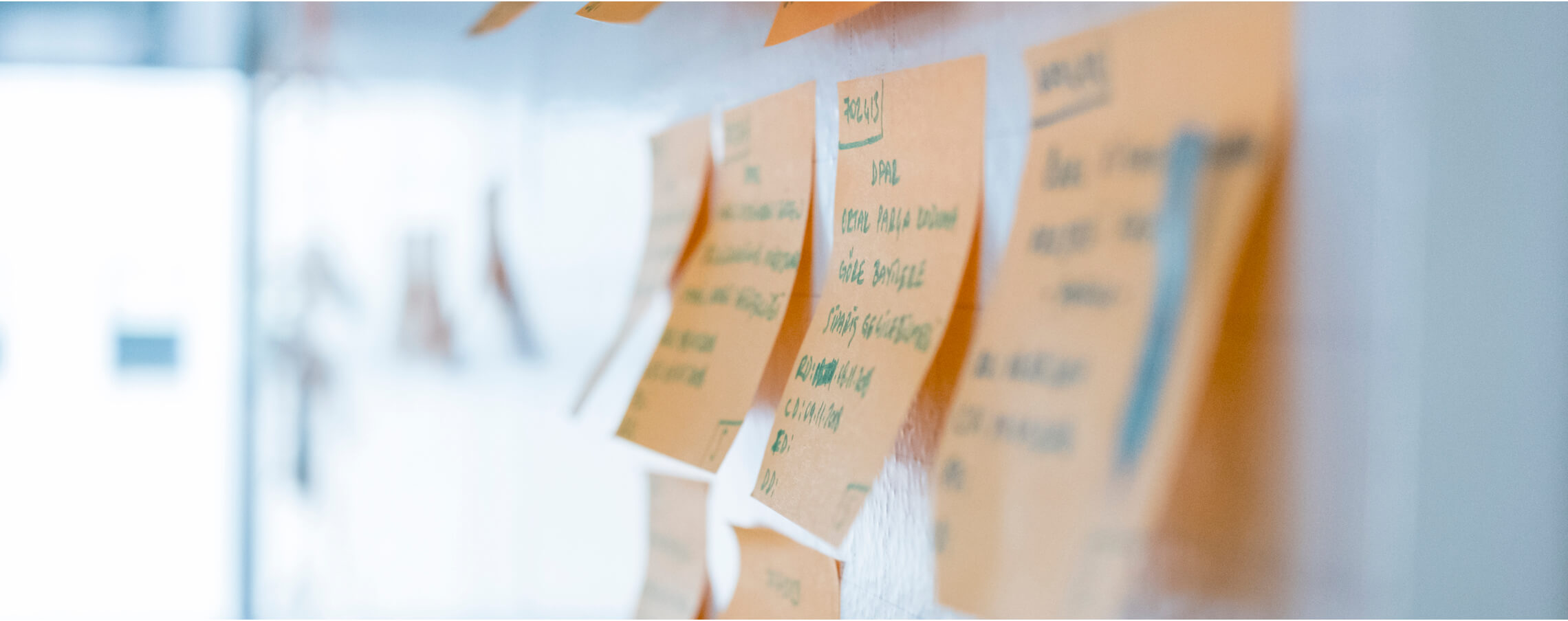 sticky notes on a wall, portraying strategy