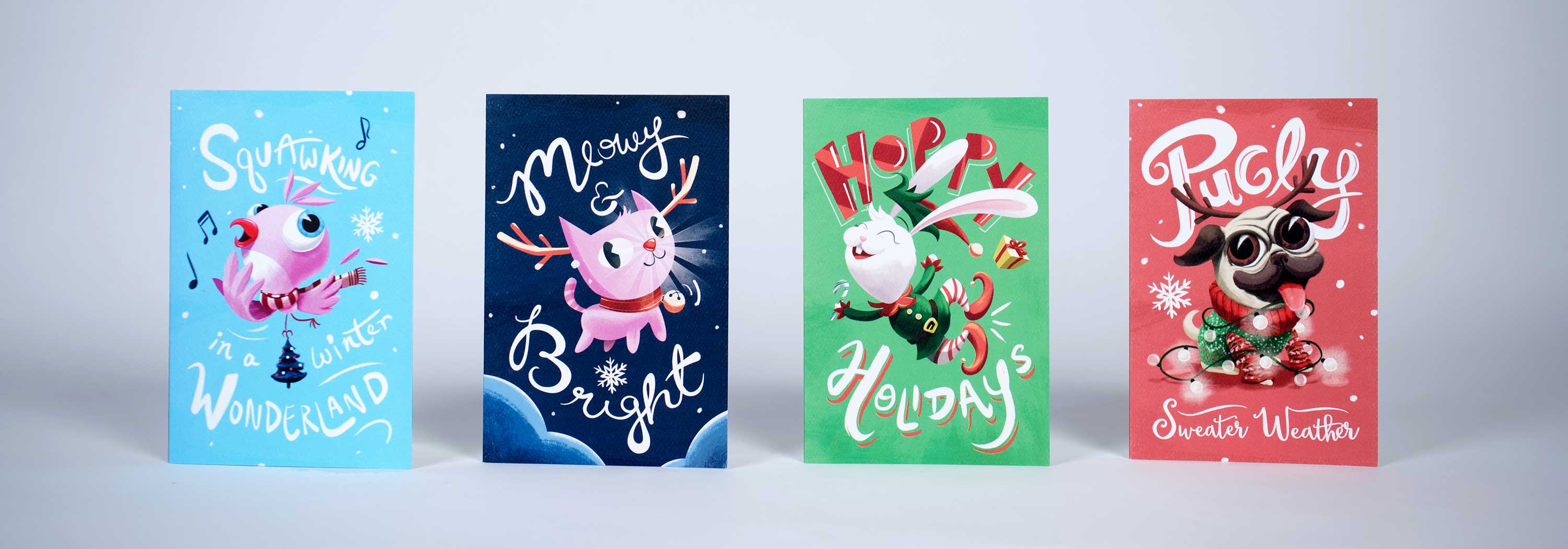 custom illustrated holiday cards with greetings and illustrated bird, cat, rabbit, dog