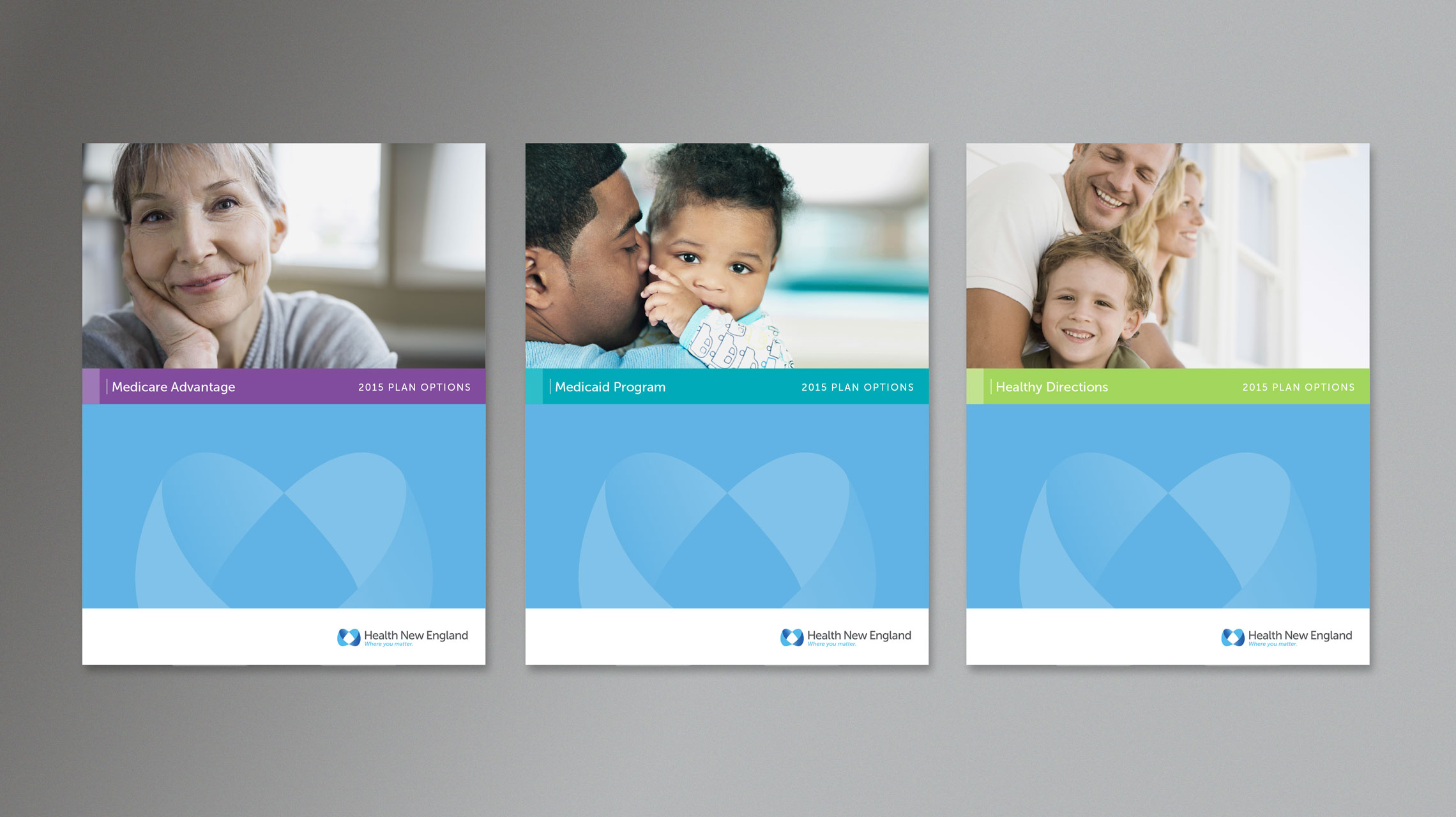 Health New England brochure system with covers including older woman, male with baby, male with young child