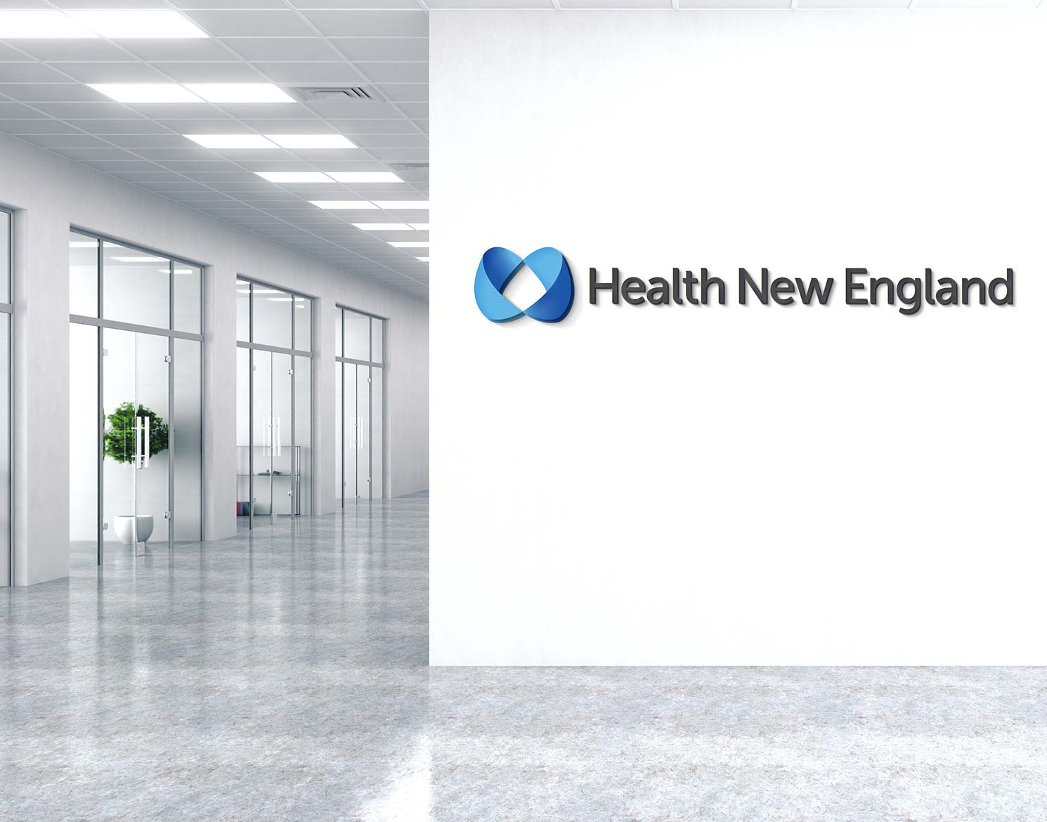 Health New England logo shown as a dimensional wall sign