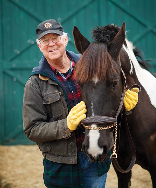 Carter Luke with horse at MSPCA Nevins Farm, President and CEO (retired)