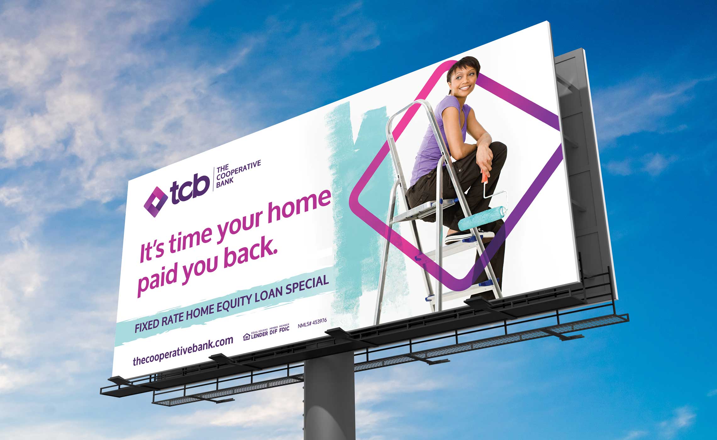 tcb billboard with sky and clouds behind