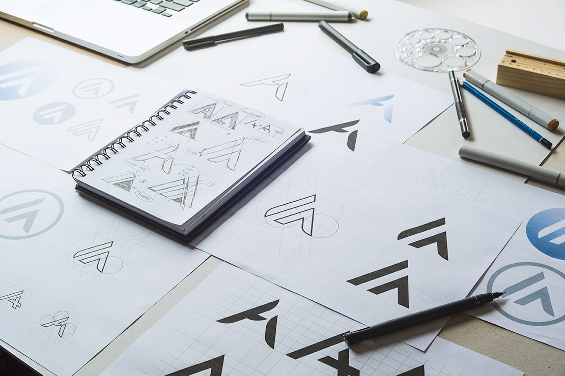 brand identity sketches and brainstorming on paper