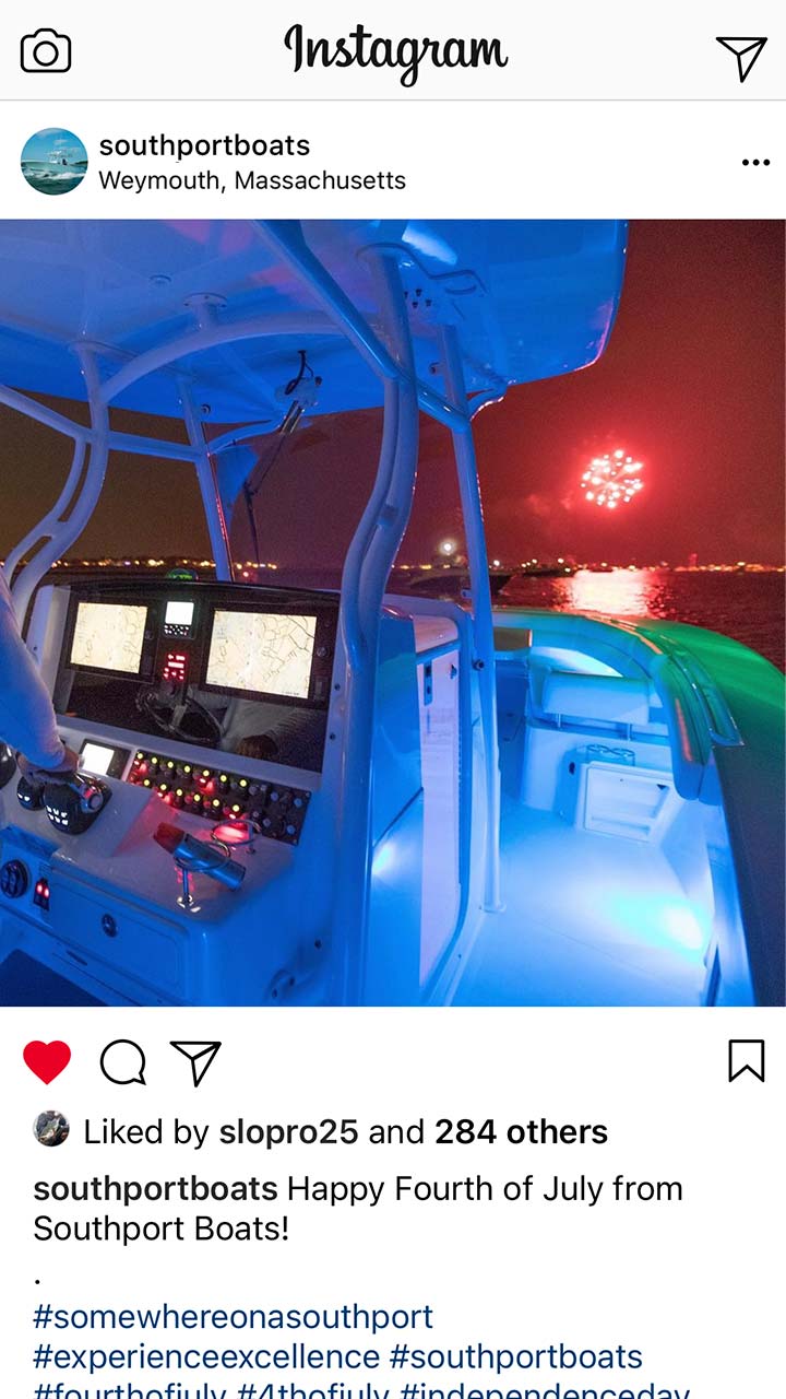 Southport Boats instagram post of boat with colored lights