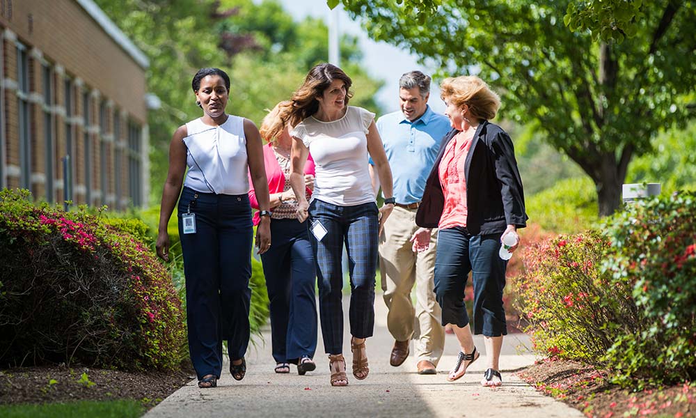 candid team photography of people walking