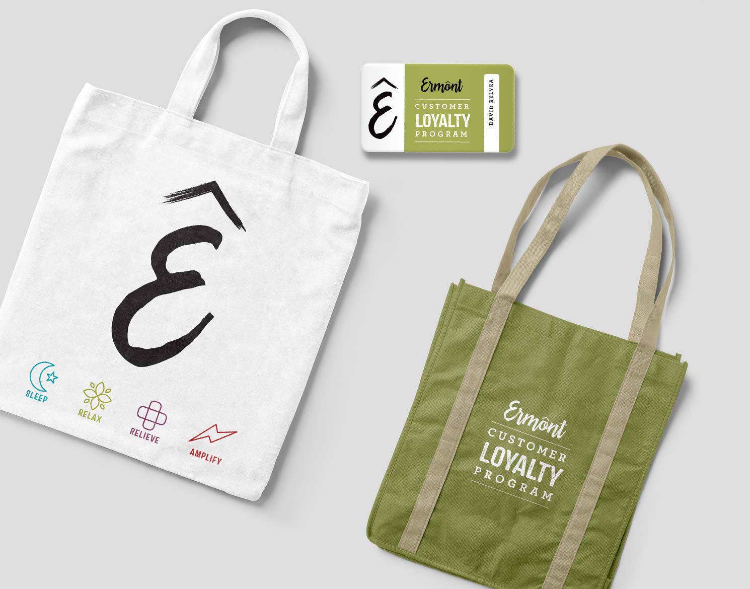 Ermont Loyalty program card and two tote bags with the Ermont logo