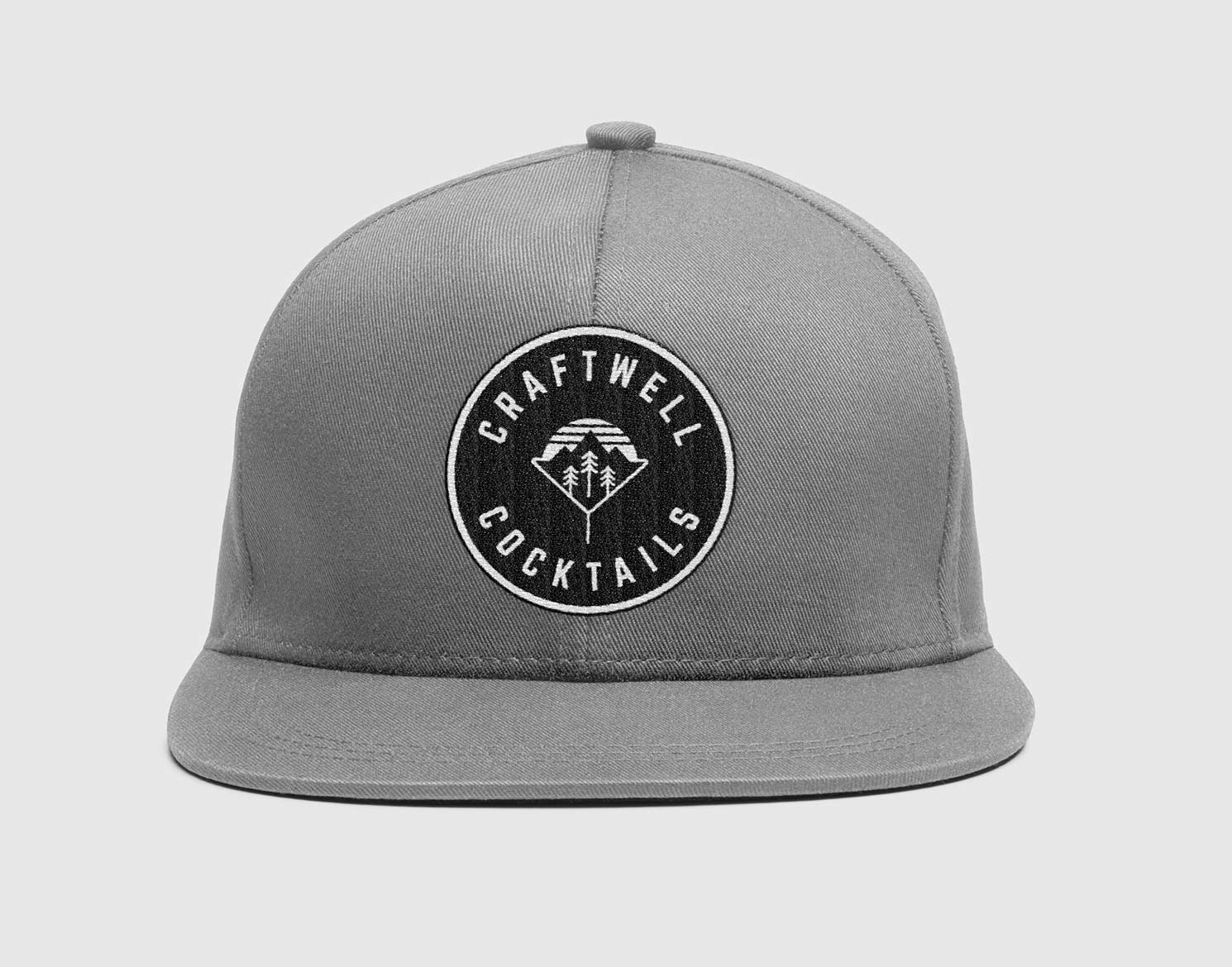 Craftwell Cocktails logo embroidered onto a grey flat-brimmed cap